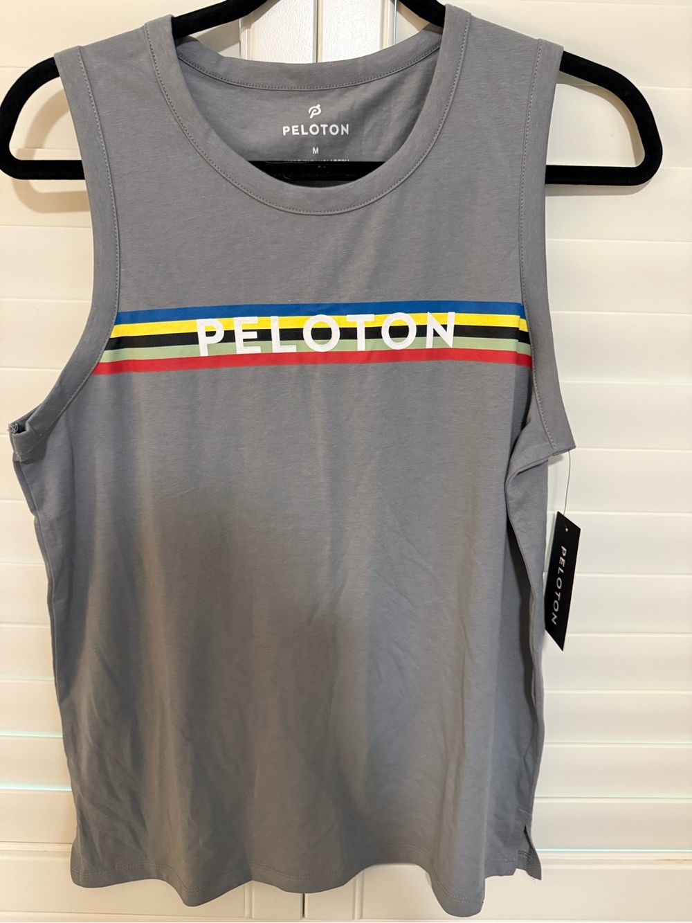 Peloton  Gray Muscle Tank with Multicolor Stripe Rainbow stripped.